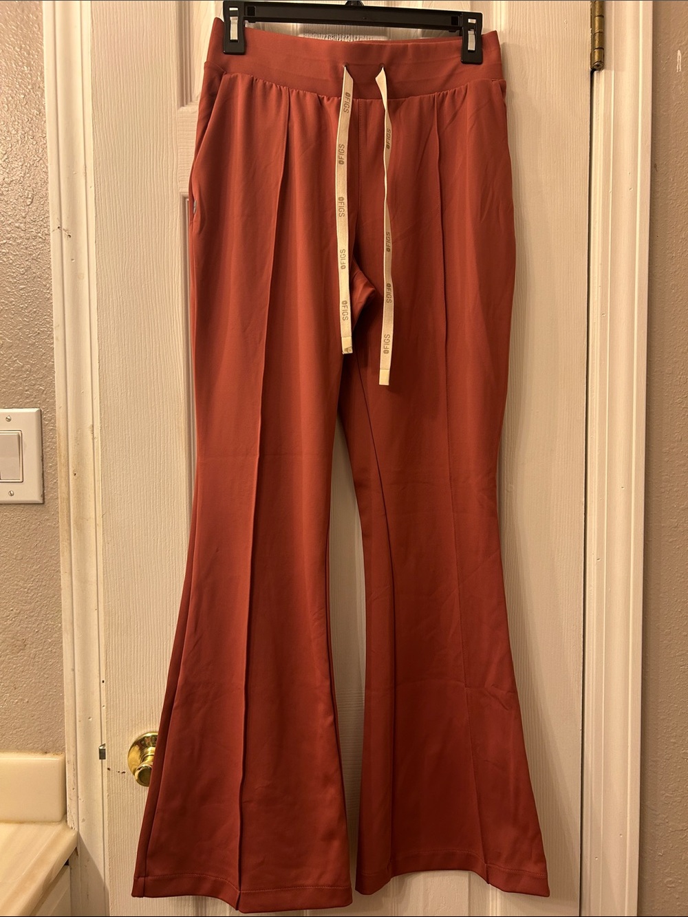 FIGS Boot‑Cut Drawstring Pants in Rusty Terracotta